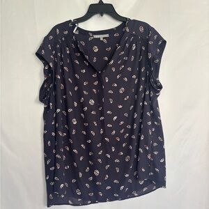 Daniel Rainn 
 blouse is a versatile top relaxed fit and buttoned front.